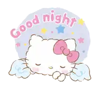a hello kitty sticker says good night with a sleeping cat