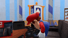 a mario video game character standing next to a nintendo switch box