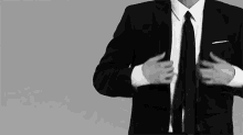 14 GIF - Suit Tie Buttons GIFs