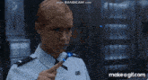 a close up of a robot 's head with the words make a gif.com on the bottom .
