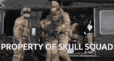 a group of soldiers standing in front of a helicopter with the words property of skull squad written on the bottom