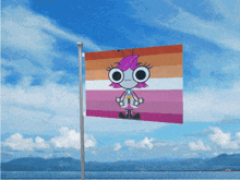 a lesbian flag with a cartoon character on it is flying in the wind