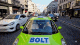a green car with the word bolt on the front