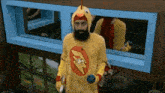 a man with a beard is dressed in a chicken costume .