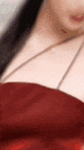 a close up of a woman 's neck and chest