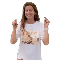 a woman wearing a t-shirt that says " follow me back "