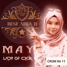 a lady wearing a hijab is standing in front of a rest area 11 logo