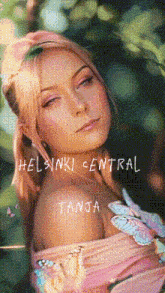 a woman in a pink dress with the words helsinki central and tanja on her chest