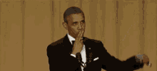 Mic Drop Obama Out GIF