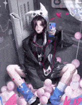 a girl is taking a picture of herself in a room with pink balloons