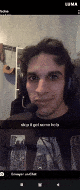 a man wearing headphones and a microphone says " stop it get some help " in a snap