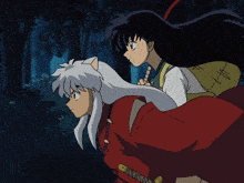 a couple of anime characters standing next to each other in the dark