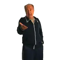 a man in a blue jacket and white stripe on the side of his pants