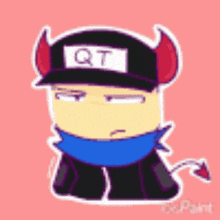 a cartoon character with horns and a hat that says qt on it .