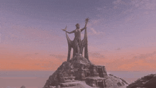 a statue of a woman holding a star and a crescent moon on top of a mountain