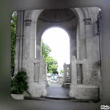 a picture of a stone archway with pixiz written on the bottom