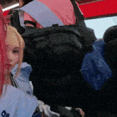 a girl with red hair is wearing a blue shirt that says ' ao ' on it