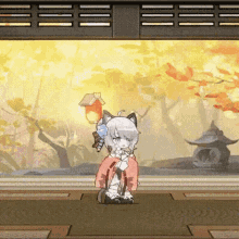 a girl with a cat 's head is standing in a room with a lantern in her hand .