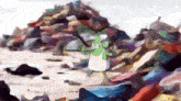 a cartoon character is standing in front of a pile of garbage .