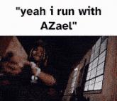 a picture of a man with the words " yeah i run with azael " written on it