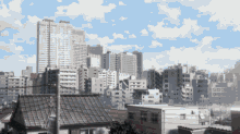 a cityscape with a blue sky and clouds