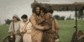 a group of people hugging each other with the words www.bandicam.com visible