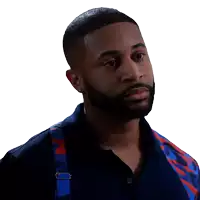 a man with a beard is wearing suspenders and a blue shirt