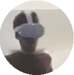 a man wearing a virtual reality headset in a circle