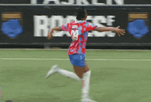 a female soccer player with the number 29 on her shirt
