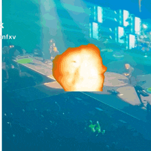 a crowd of people watching a concert with the word nfxv on the bottom right