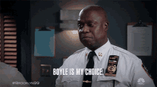 a police officer says boyle is my choice while wearing a uniform and tie