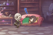 a girl standing next to a girl sleeping on a couch with a blue sticker that says zzz