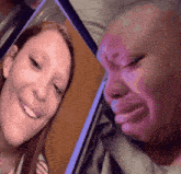 a woman is smiling and another is crying