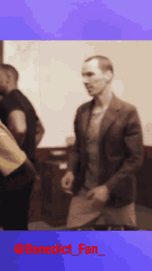 a blurry picture of a man with the words benedict fan written on the bottom