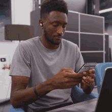 Playing With Smartphone Marques Brownlee GIF - Playing With Smartphone Marques Brownlee Typing On Smartphone GIFs