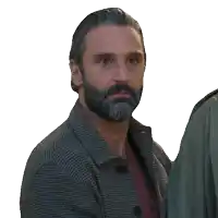 a man with a beard is making a funny face and says me
