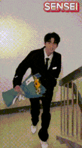a man in a suit is carrying a bouquet of flowers and the word sensei is on the bottom
