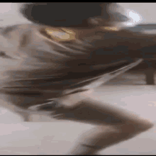 a blurry picture of a person standing on a skateboard