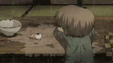 a cartoon drawing of a boy eating a broken eyeball