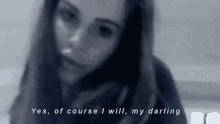 a blurry photo of a woman with the words yes of course i will my darling