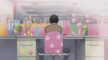 a man sits in a pink chair with the words pull yourself together