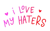 a sign that says i love my haters with pink hearts