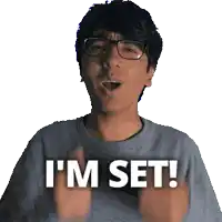 a man with glasses says i 'm set with his hands