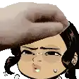 a person is putting a hat on a cartoon character 's head .