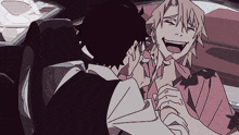 a couple of anime characters sitting in a car laughing
