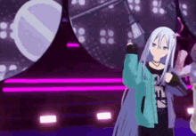 a girl in a blue jacket is standing on a stage with a microphone .