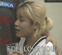 a woman holding a glass with the words edi i love you written below her
