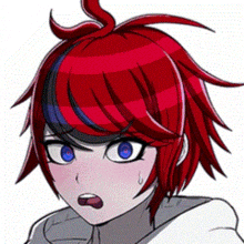 a close up of a girl with red hair and blue eyes .