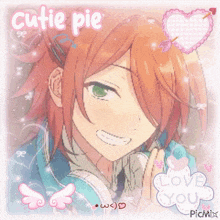 a picture of a boy with red hair and green eyes with the words " cutie pie " above him