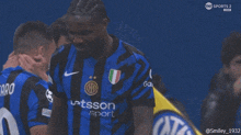 a soccer player wearing a shirt that says tsson sport